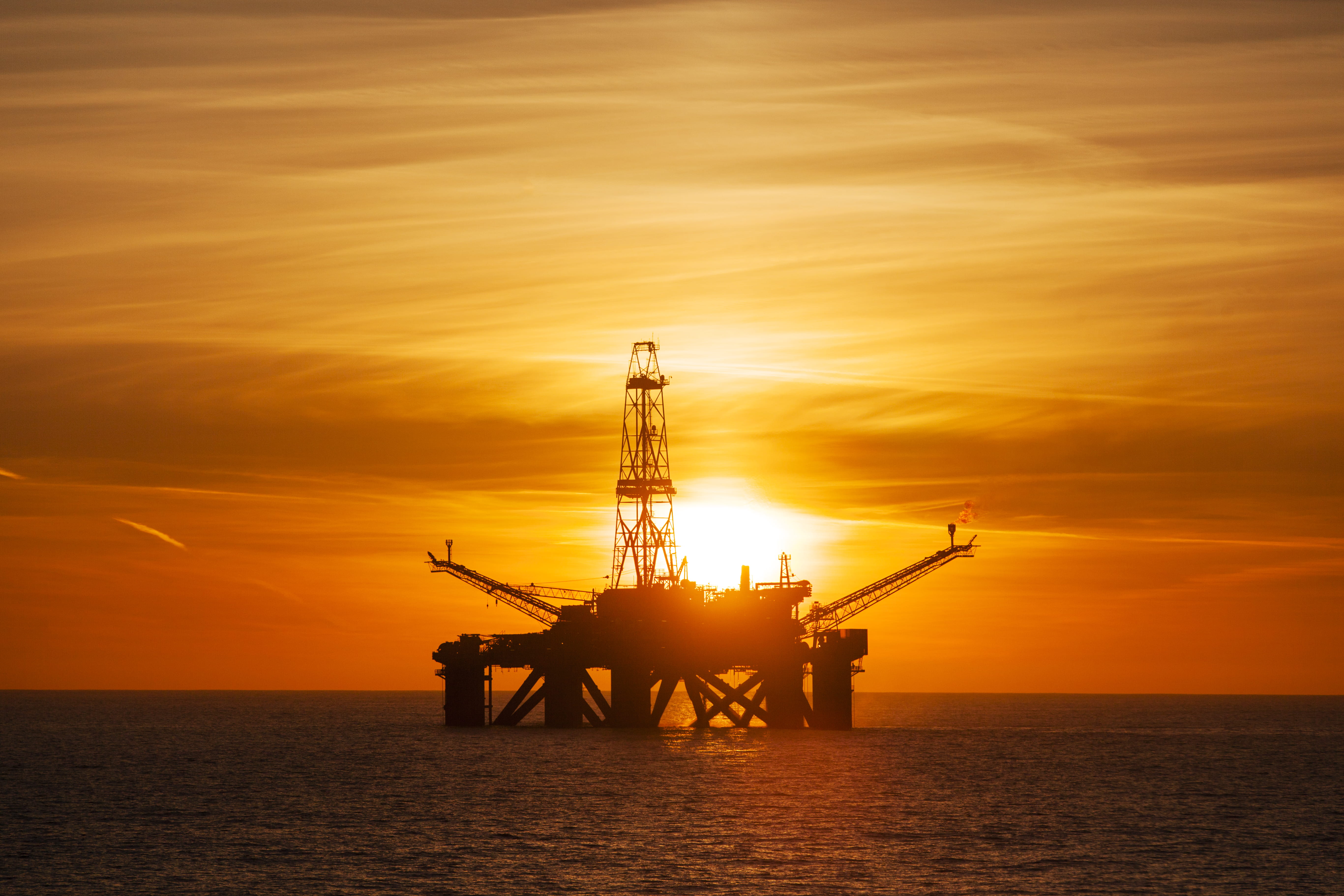 offshore rig at sunset